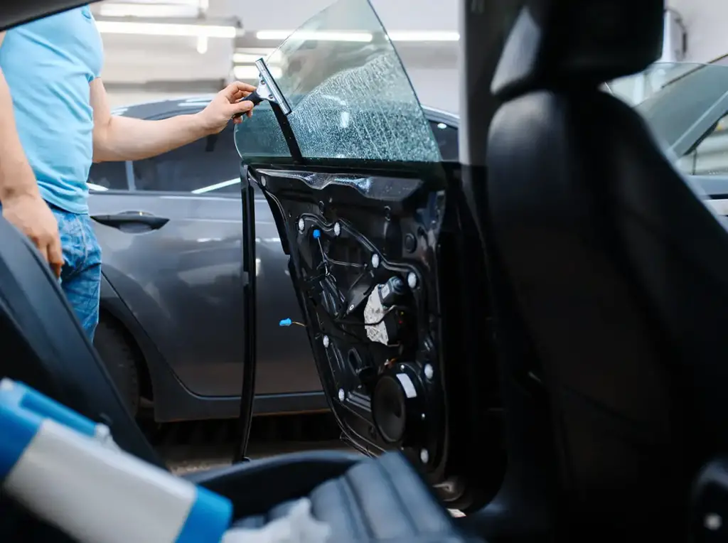 Professional window tinting service at Grand Prix Customs in Brooklyn, NY